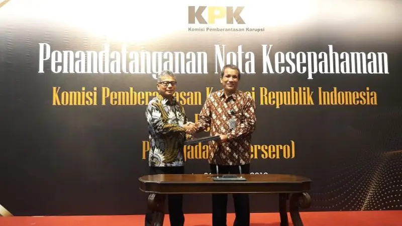 Pegadaian dan KPK melakukan penandatanganan nota kesepahaman mengenai prinsip good corporolate governance (GCG) di Kantor Pusat Pegadaian, Jakarta, Senin (6/8/2018). (Dwi Aditya Putra/Merdeka.com)