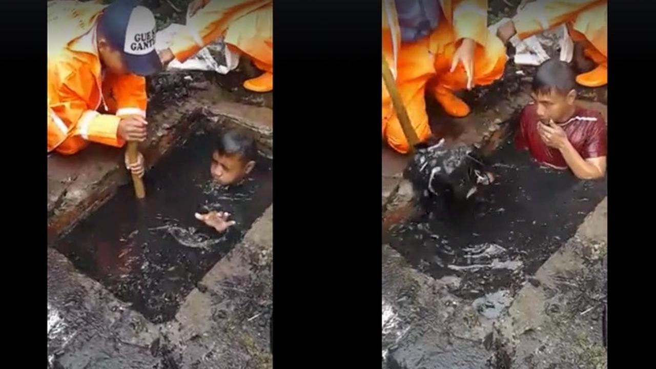 Viral, Aksi Pasukan Oranye Menyelam dalam Got Buat Netizen Takjub 