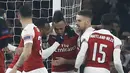 Perayaan gol kedua Aubameyang pada leg kedua,babak 16 besar Liga Europa yang berlangsung di Stadion Emirates, London, Jumat (15/3). Arsenal menang 3-0 atas Rennes. (AFP/Ian Kington)
