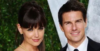 Tom Cruise menikah dengan Katie Holmes pada tahun 2006 silam. Kisah cinta mereka bersemi karena Katie Holmes penggemar berat Tom Cruise. Namun sayang, pernikahan mereka harus kandas di tahun 2012 lalu. (AFP/Bintang.com)