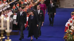 Harry (38) terlihat memasuki Westminster bersama sepupunya, Putri Beatrice dan Putri Eugenie, serta pasangan mereka masing-masing. (Aaron Chown/Pool Photo via AP)