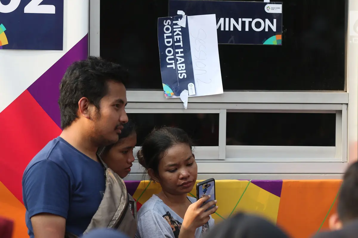 Tiket Habis, Calon Penonton Tetap Antre Saksikan Final Bulu Tangkis Asian Games 2018