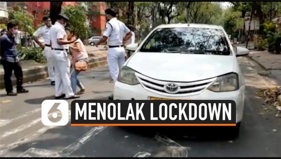 VIDEO: Langgar Aturan Lockdown, Perempuan Ini Malah Jilat Polisi yang Memperingatinya
