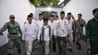 Bakal calon presiden (bacapres) Anies Baswedan dan bakal calon wakil presiden (bacawapres) Muhaimin Iskandar alias Cak Imin ziarah ke Makam Sunan Ampel, Surabaya, Sabtu (9/9/2023). (Foto:&nbsp;Dokumen PKB)