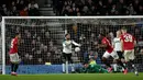 Pemain Manchester United Odion Ighalo (ketiga kanan) melakukan selebrasi usai mencetak gol ke gawang Derby County pada pertandingan putaran kelima Piala FA di Pride Park, Derby, Inggris, Kamis (5/3/2020). Manchester United menang dengan skor 3-0. (AP Photo/Rui Vieira)