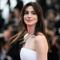 Anne Hathaway tiba untuk pemutaran film "Armageddon Time" selama Festival Film Cannes edisi ke-75 di Cannes, Prancis selatan, 19 Mei 2022. (PATRICIA DE MELO MOREIRA/AFP)