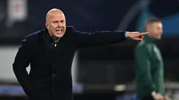 Arne Slot Slot diperkenalkan sebagai pelatih kepala, bukan manajer seperti Klopp. Peran Slot ini menandai era baru dalam struktur manajemen Liverpool. The Reds baru-baru ini diketahui tengah melakukan restrukturisasi di sisi manajemen. (AFP/John Thys)