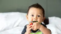 Ilustrasi bayi tumbuh gigi./Copyright shutterstock.com