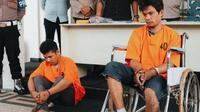 Tersangka pembunuhan pemulung dalam konferensi pers di Polres Pelalawan. (Liputan6.com/Istimewa)