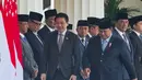 Presiden Prabowo Subianto berjabat tangan dengan Perdana Menteri Singapura Lawrence Wong saat kunjungan resmi untuk menghadiri Leaders Retreat di Istana Merdeka, Jakarta, Senin (6/7/2026). (AP Photo/Achmad Ibrahim)