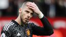 David De Gea. Sejak lama memang telah diprediksi jika kiper Manchester Unted berusia 32 tahun ini akan gagal berangkat ke Piala Dunia 2022 Qatar. Melimpahnya kiper berkualitas di Timnas Spanyol ditambah penampilannya yang naik turun bersama MU membuatnya mulai terpinggirkan. Laga terakhirnya bersama Tim Matador terjadi lebih dari dua tahun lalu, dan mulai saat itu ia lebih sering menghangatkan bangku cadangan. (AFP/Ian Hodgson)