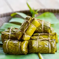 ilustrasi kue bungkus daun pisang/Thanaphum Chamnanprai/Shutterstock