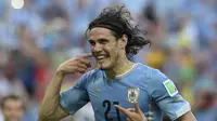 Penyerang Uruguay Edinson Cavani Usai Mencetak Gol ke Gawang Kosta Rika (DANIEL GARCIA/AFP)