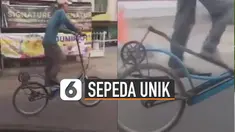 Bentuk sepeda yang digunakan pria tersebut hampir mirip alat olahraga treadmill.