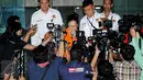 Damayanti Wisnu Putranti keluar dari Gedung KPK usai menjalani pemeriksaan, Jakarta, Senin (18/1/2016). DWP diperiksa karena diduga menerima suap terkait proyek di Kementerian PUPR (Liputan6.com/Helmi Afandi)