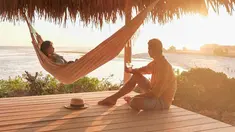 Pasangan artis Christian Sugino dan Titi Kamal sedang menikmati liburan mereka dengan menjelajahi Indonesia bagian timur. Seperti ketika mereka tengah menikmati indahnya sunset di pulau Rote ini. (Liputan6.com/titi_kamall)