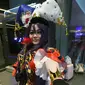 Seorang cosplayer berpose pada hari pertama Festival Anime Asia di Singapura (29/11/2019). Cosplay  merupakan "permainan kostum" yang berasal dari Jepang dengan pengikut sekte yang sekarang mendunia. (AFP Photo/Roslan Rahman)