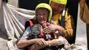 Buldoser menyelamatkan warga California yang terjebak di rumah setelah Badai Tropis Hilary menimbun lingkungan mereka dengan lumpur. (DAVID SWANSON / AFP)