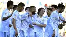 Para pemain Real Madrid merayakan gol Karim Benzema saat melawan Las Palmas pada lanjutan La Liga Santander di Gran Canaria stadium, Canary island, (31/3/2018). Madrid menang 3-0. (AP/Lucas de Leon)