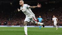 Penyerang Galatasaray, Mauro Icardi, senang dan marah setelah mengalahkan Manchester United dengan skor 3-2 pada matchday kedua Grup A Liga Champions 2023/2024, Rabu (4/10/2023) dini hari WIB. (AFP/Darren Staples)