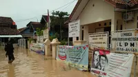 Pandeglang Dikepung Banjir hingga Adele Dapat Grammy Awards