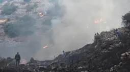 Kebakaran lahan terlihat di wilayah pedesaan di Provinsi Hama, Suriah tengah, pada 9 September 2020. Api melalap tanah pertanian di wilayah pedesaan provinsi tersebut, papar seorang pejabat Suriah pada Rabu (9/9). (Xinhua/Stringer)