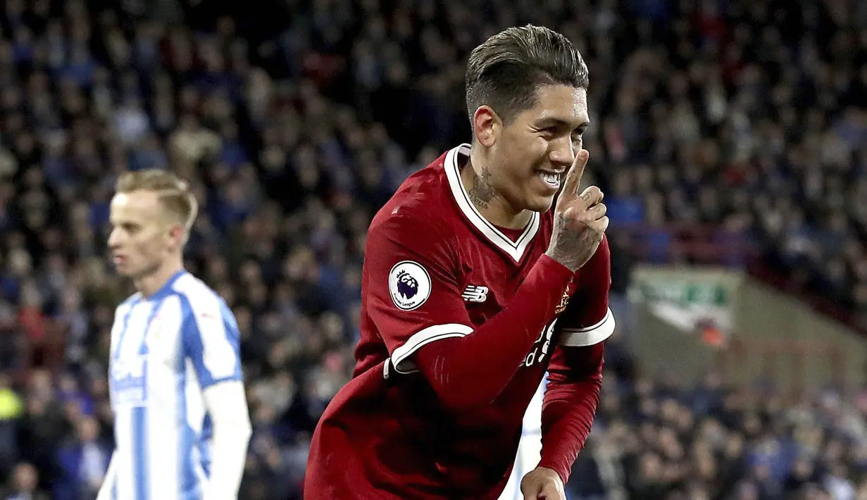 6. Roberto Firmino (Liverpool) - 12 Gol (1 Penalti). (AP/Martin Rickett)