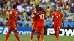 Selebrasi pemain Timnas Belanda usai membekuk Meksiko 2-1 di laga 16 besar Piala Dunia 2014 di Stadion Castelao, Fortaleza, (29/6/2014). (REUTERS/Marcelo Del Pozo)