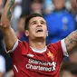 Gelandang Liverpool, Philippe Coutinho, merayakan gol yang dicetaknya ke gawang Middlesbrough pada laga Premier League di Stadion Anfield, Liverpool, Minggu (21/5/2017). (AFP/Paul Ellis)