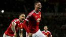 Pemain Manchester United, Chris Smailling merayakan gol yang dicetaknya ke gawang Wolfsburg pada laga Liga Champions di Stadion Old Trafford, Inggris, Kamis (1/10/2015). MU berhasil menang 2-1. (Action Images via Reuters/Lee Smith)