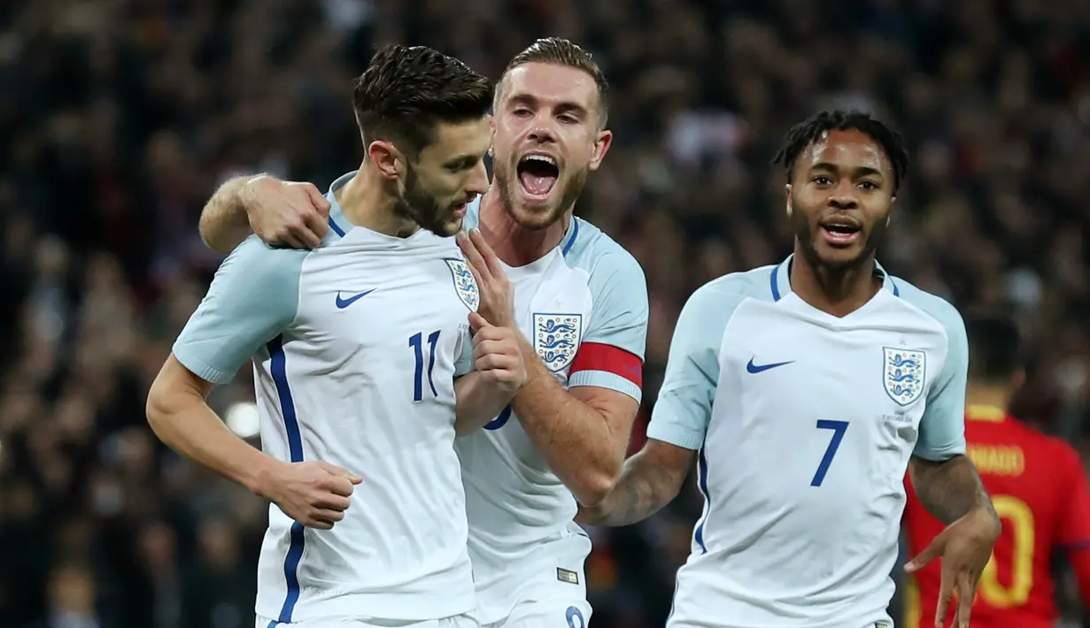 Pemain Inggris, Adam Lallana (kiri), merayakan golnya ke gawang Spanyol bersama Jordan Henderson dan Raheem Sterling dalam laga persahabatan di Stadion Wembley, Selasa (15/11/2016). (Reuters/Eddie Keogh)
