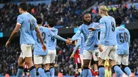 Para pemain Man City merayakan gol yang dicetak Antoine Semenyo ke gawang Exeter City pada lanjutan Piala FA, Sabtu malam WIB (10/1/2026). (Oli SCARFF / AFP)