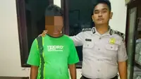 Pelaku pemasang jerat babi listrik berujung maut di Kabupaten Rokan Hilir, Riau. (Liputan6.com/M Syukur)