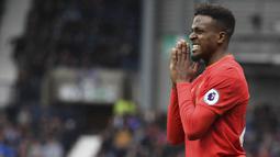 Divock Origi pemain Belgia yang saat ini berkostum Liverpool. Origi telah tampil 22 kali dan mencetak 3 gol untuk timnas Belgia.   (AFP/Justin Tallis)