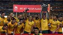 Negara terakhir yang sukses menjadi juara Piala Asia saat berstatus tuan rumah adalah Australia. The Socceroos melakukannya pada edisi ke-16 tahun 2015. Di partai final Australia sukses menjinakkan Korea Selatan dengan skor 2-1 lewat perpanjangan waktu. (AFP/Saeed Khan)