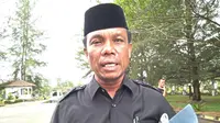 Mantan Ketua DPRK Nagan Raya, Provinsi Aceh, Syamsuardi yang berstatus sebagai tahanan Lapas Kelas III Calang, Kabupaten Aceh Jaya, kedapatan pelesiran keluar lapas. (Liputan6.com/ Rino Abonita)
