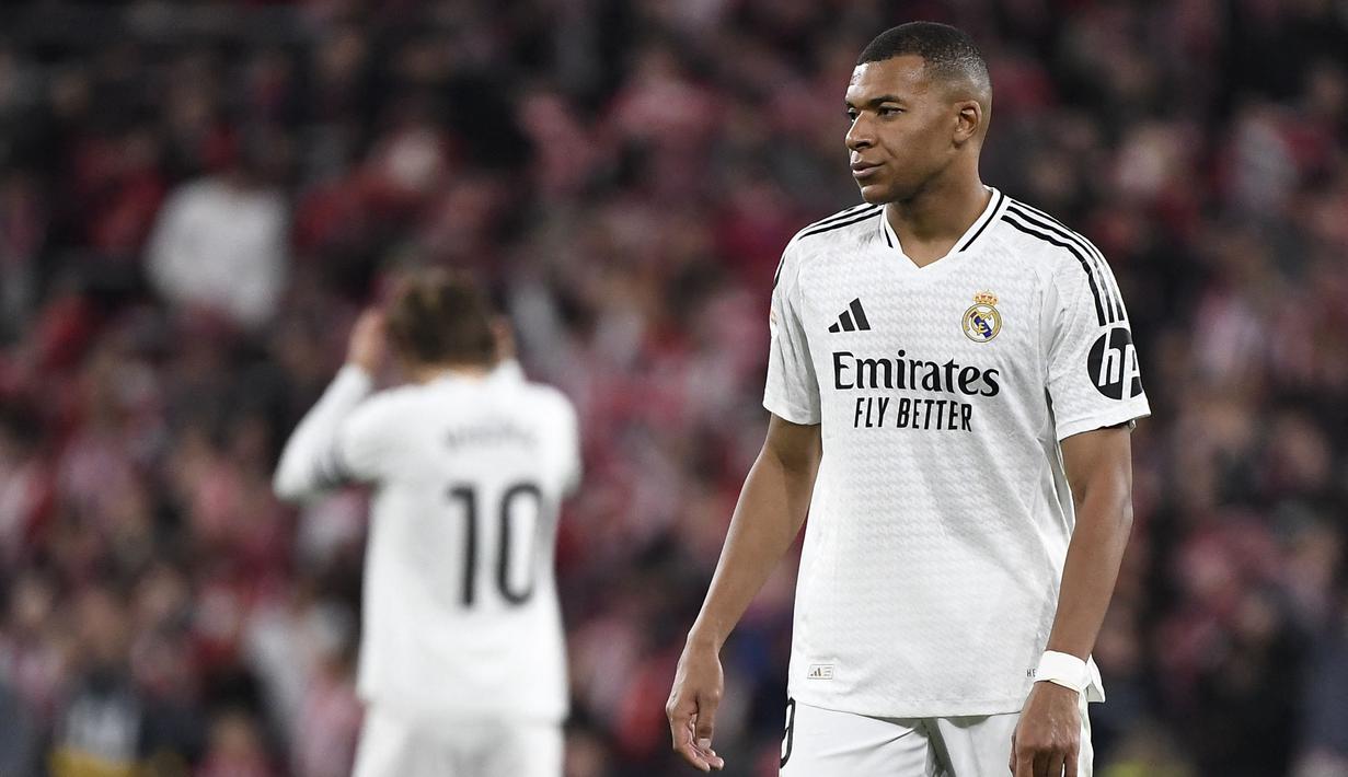 Pemain Real Madrid, Kylian Mbappe saat laga lanjutan Liga Spanyol 2024/2025 melawan Athletic Bilbao di San Mames Stadium, Bilbao, Spanyol, Kamis (05/12/2024) dini hari WIB. (AFP/Ander Gillenea)