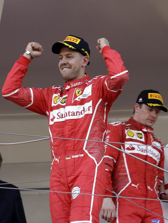 Ekspresi Sebastian Vettel usai menjuarai balapan F1 GP Monako mengalahkan Kimi Raikkonen di Monte-Carlo, (28/5/2017). (AP/Claude Paris)