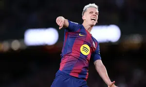 Gelandang Barcelona, Daniel Olmo, merayakan gol pembuka saat pertandingan Liga Spanyol antara FC Barcelona vs Real Oviedo di Stadion Camp Nou, Barcelona, pada 25 Januari 2026. (Josep LAGO / AFP)
