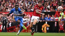 Penyerang Brighton &amp; Hove Albion, Danny Welbeck, ketika melawan Manchester United. (Bola.com/Dok.AFP/OLI SCARFF).