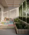 Desain Teras Ramah Balita dengan Kebun Mini Model Teras dengan Area Bermain Beralas Matras / Ilustrasi gambar oleh AI