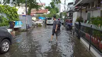 Banjir di Jalan Kebon Sirih Barat I, Jakarta Pusat, Selasa (25/2/2020). (Liputan6.com/Putu Merta Surya Putra)