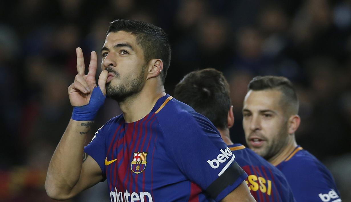 Gaya selebrasi pemain FC Barcelona, Luis Suarez usai membobol gawang Deportivo Deportivo Coruna pada lanjutan La Liga Santander di Camp Nou stadium, Barcelona, (17/12/2017). Barcelona menang 4-0. (AP/Manu Fernandez)