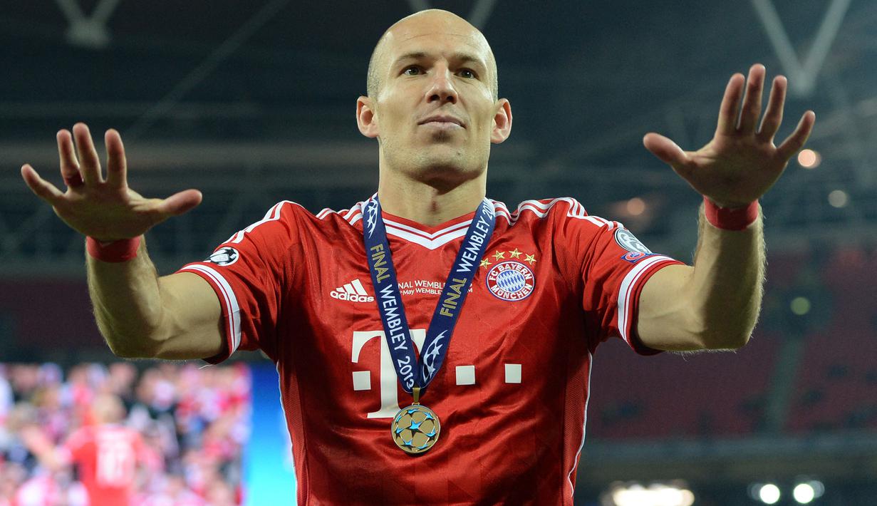 Sebelum menjadi seorang legenda Bayern Munchen, Arjen Robben pernah mengalami masa pahit bersama Chelsea setelah sering dilanda cedera. The Blues akhirnya menjual Robben ke Barcelona. Setelah dua tahun di Camp Nou, ia akhirnya merasakan gelar Liga Champions. (AFP/Patrik Stollarz)