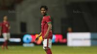 Pemain Timnas Indonesia U-23, Ilham Udin Armain saat melawan Suriah U-23 pada laga persahabatan di Stadion Wibawa Mukti, Bekasi, Rabu (16/11/2017). Indonesia kalah 2-3. (Bola.com/NIcklas Hanoatubun)