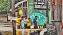 Ratusan orang di Cobija, Amazon Bolivia mengalami banjir yang belum pernah terjadi sebelumnya. (STRINGER/AFP)