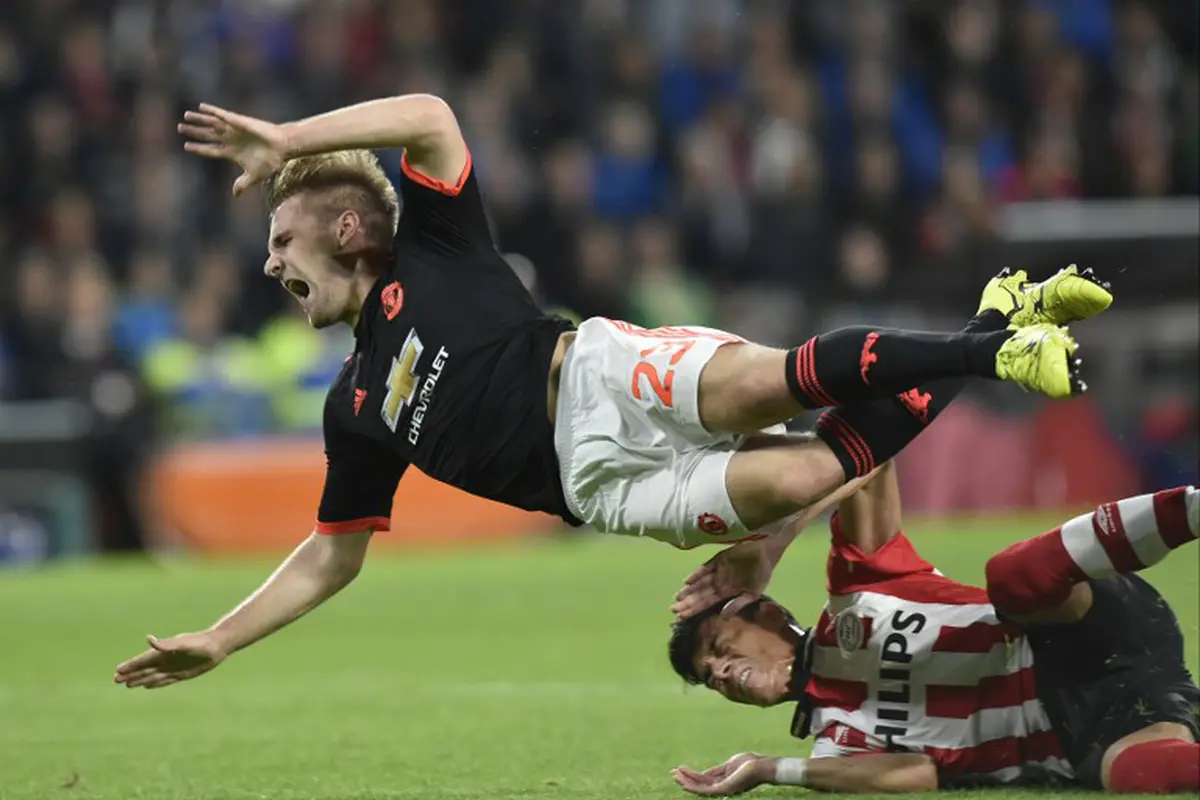 Luke Shaw - Hector Moreno (AFP PHOTO / JOHN THYS )