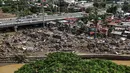 Foto udara menunjukkan rumah-rumah yang rusak akibat terjangan Topan Kalmaegi di Talisay, Provinsi Cebu, Filipina, pada Rabu 5 November 2025. Sebagian besar korban tewas akibat banjir besar yang menyapu permukiman, menyeret puluhan kendaraan, dan memaksa warga berlindung di atap rumah mereka. (Jam STA ROSA/AFP)