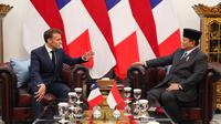 Pertemuan empat mata kedua antara Presiden Prabowo Subianto dan Presiden Prancis Emmanuel Macron berlangsung tertutup. (Ludovic MARIN/AFP)