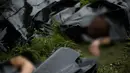  Sebanyak 298 penumpang pesawat Malaysia Airlines MH17 yang ditembak jatuh di Ukraina dipastikan meninggal (REUTERS/Maxim Zmeyev) 